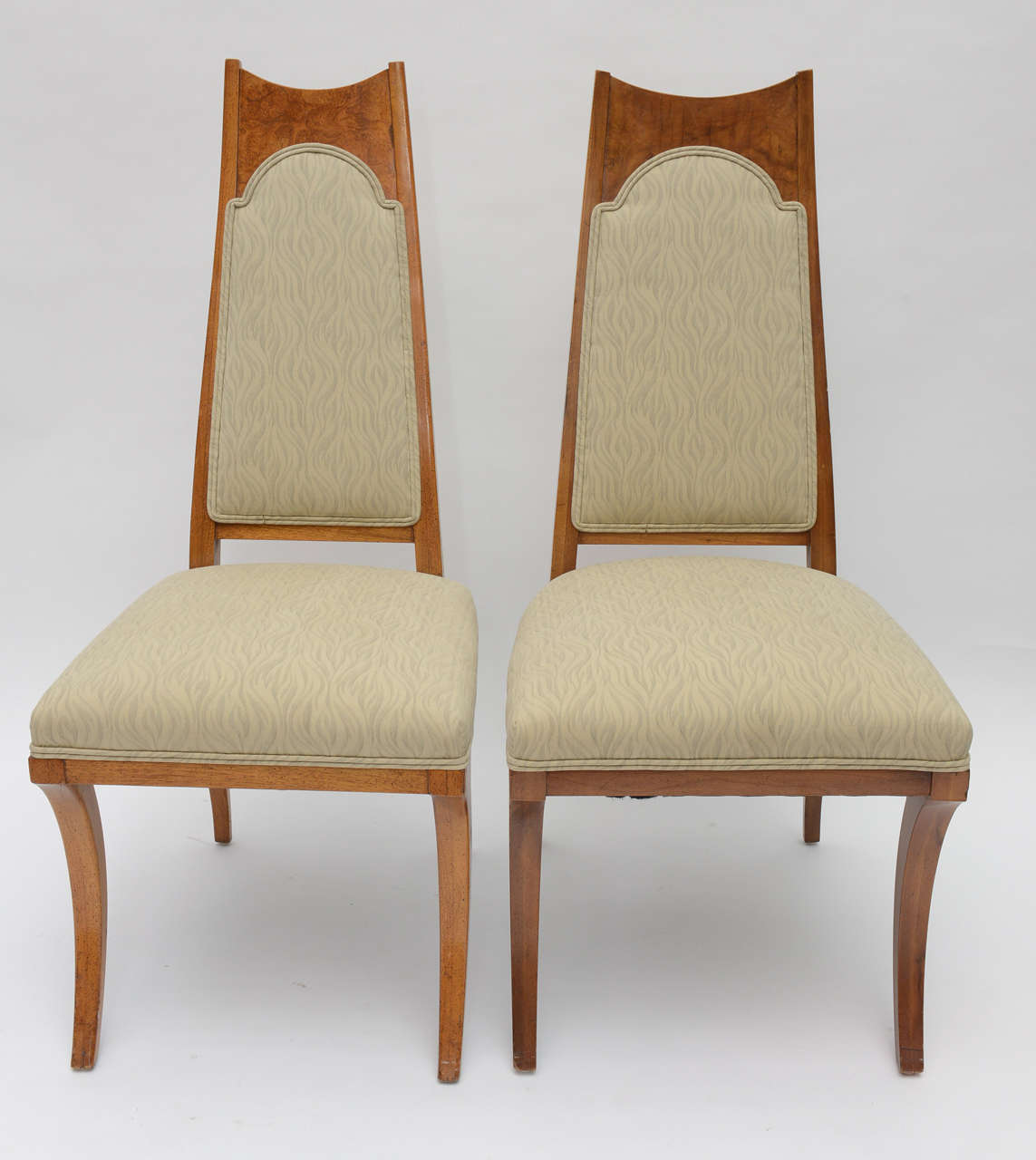 High style and elegant mid century modern chairs with upholstered seats and backs. Set of six.