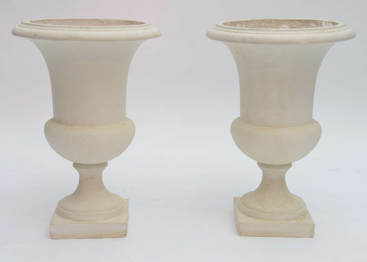 Pair of Serge Roche style classical plaster urn lights.