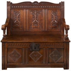 Carved Oak Settle with Storage