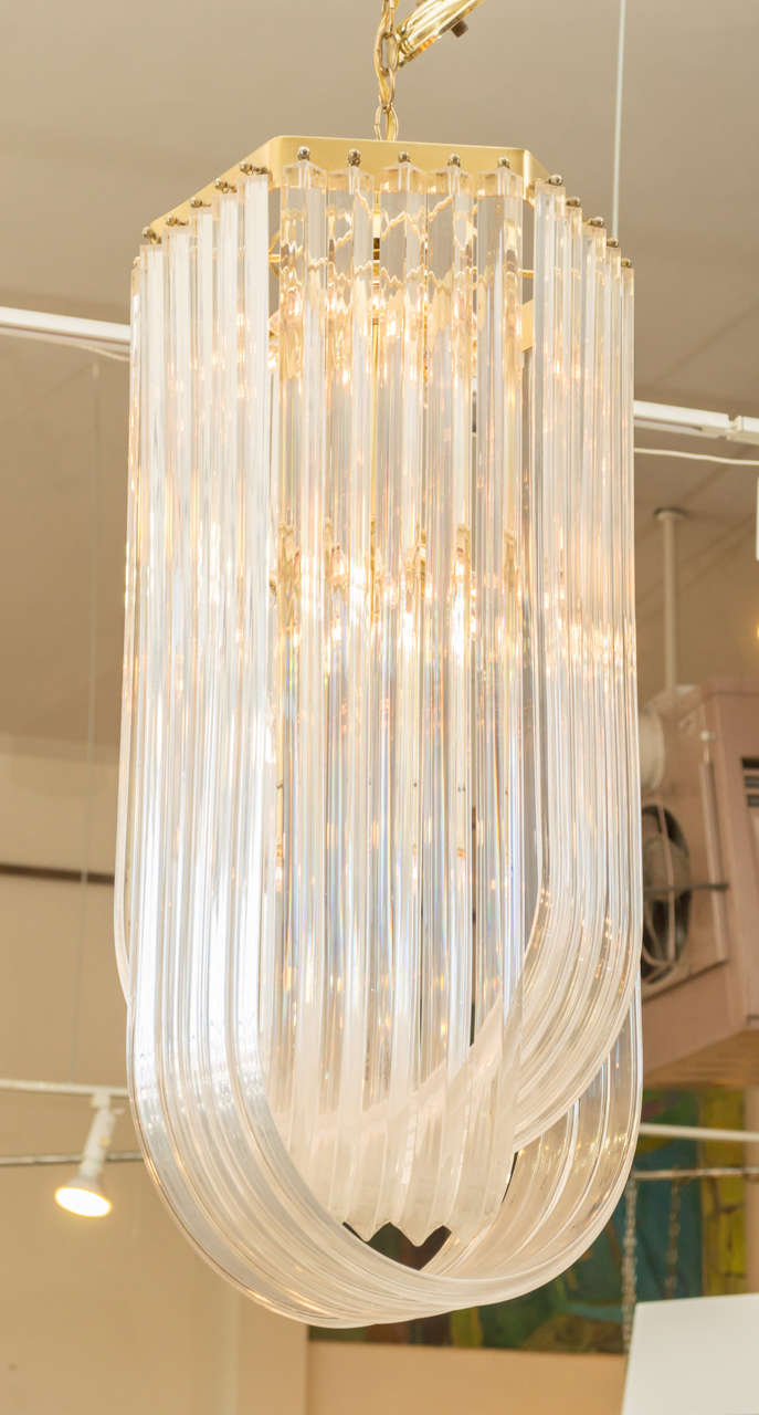 Offering this very large lucite pendant  that would be great in a lobby, a stair well, or over a dining table.  The fixture puts out a lot of light due to its 15 bulb capacity.