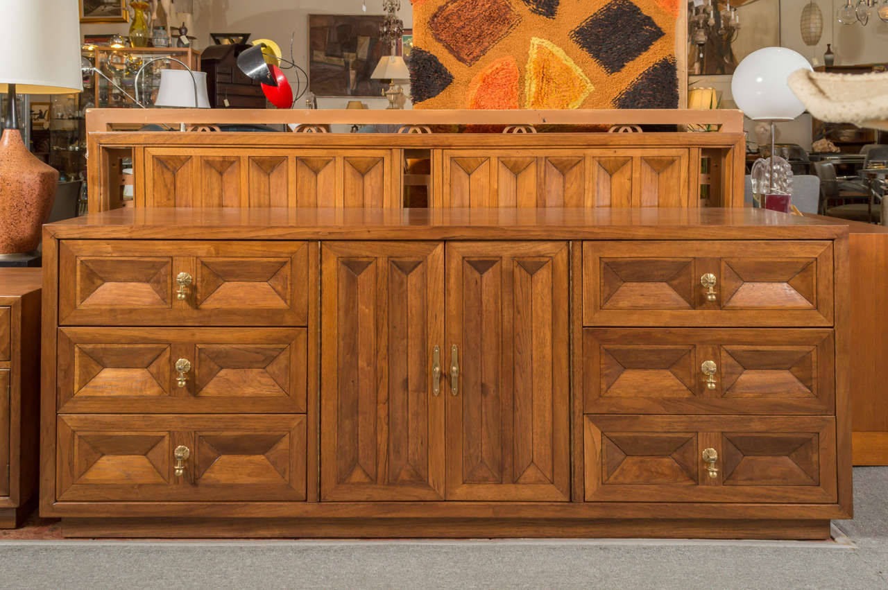 A Spanish Revival-style solid walnut king size headboard by American of Martinsville, ONLY (other items in the first photo have been sold).

A handsome Mid-Century modern take on Spanish Revival, featuring crisp three-dimensional geometric forms