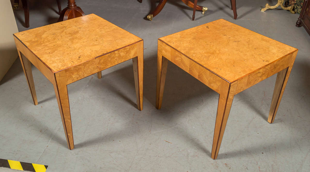 1950s Italian Olive burl wood veneer side tables. Both are a practical size with graceful lines. Top has a slightly rounded edge in dark walnut for a softer line and the classic square tapered leg gives a graceful appearance.