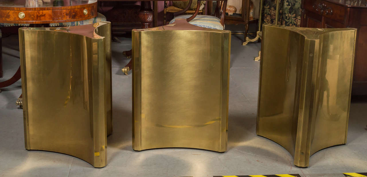 Offering a set of three, sleek Mastercraft Brass dining table bases.
***On Sale**** Was priced individually at $2,950.00 each for a total of $8,850.00. 
Now all three for only $3,800.00