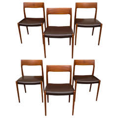 Used Six Teak JL Moller Chairs with Brown Leather Seats, One a Captain's Chair