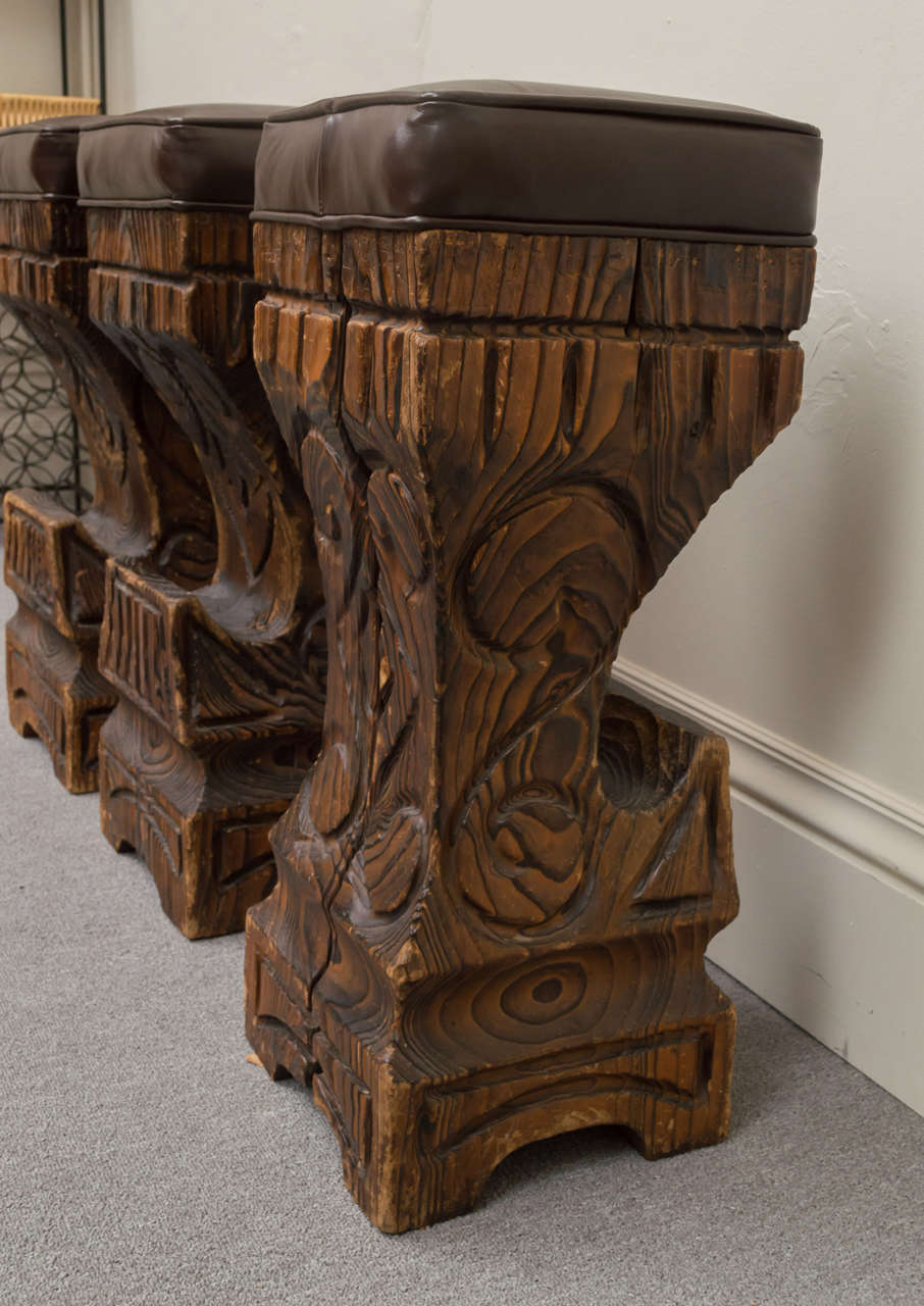 Late 20th Century Three 1970s Witco Carved Tiki Bar Stools with Leather Seats