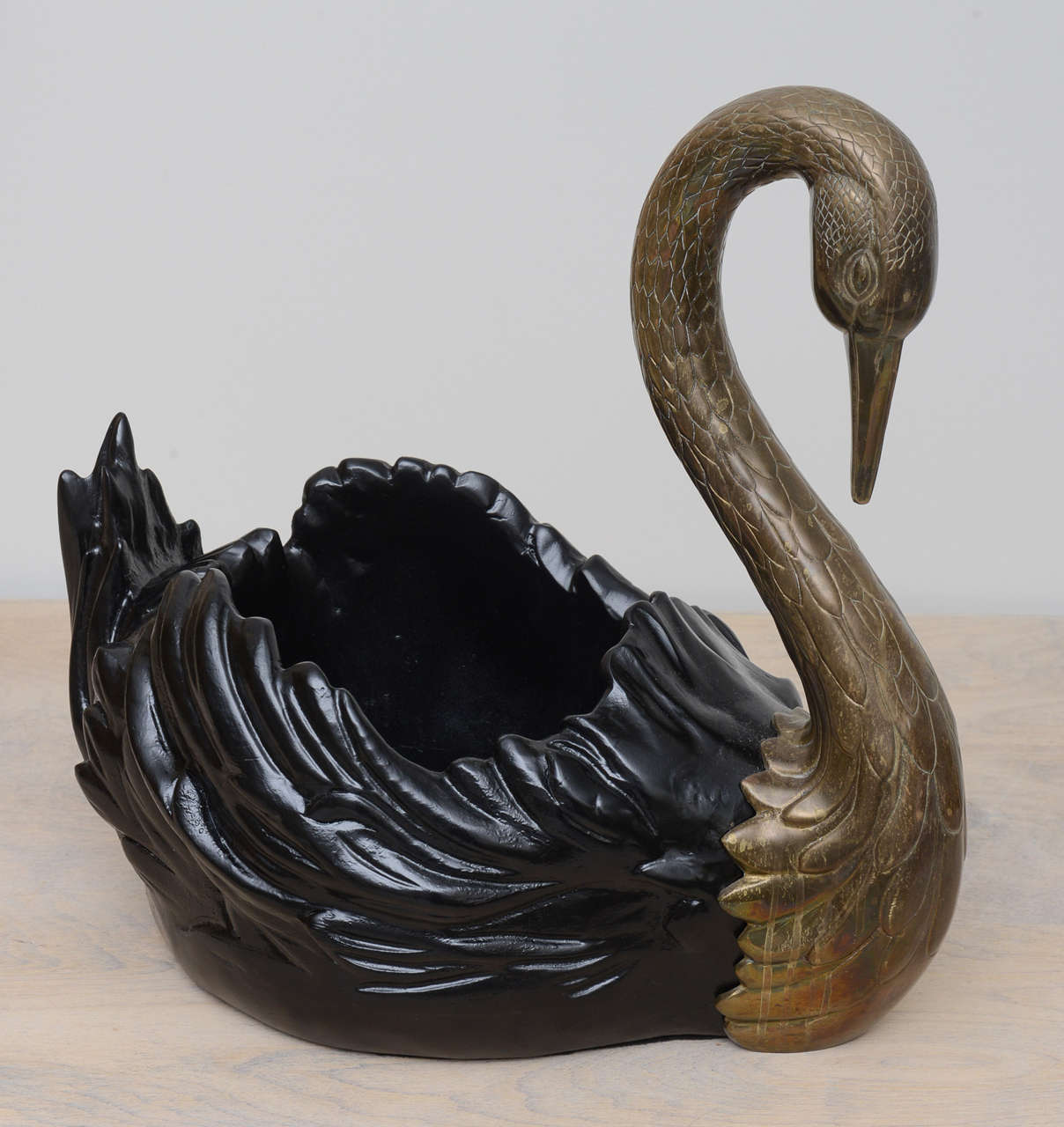 Charming swan center piece with lovely patina.