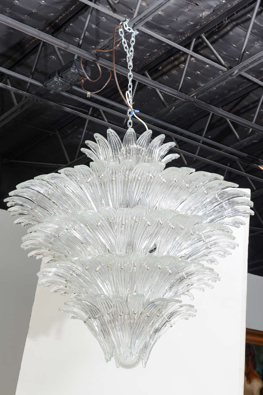 Each handblown piece with leaf decoration all individually fastened to a framework.