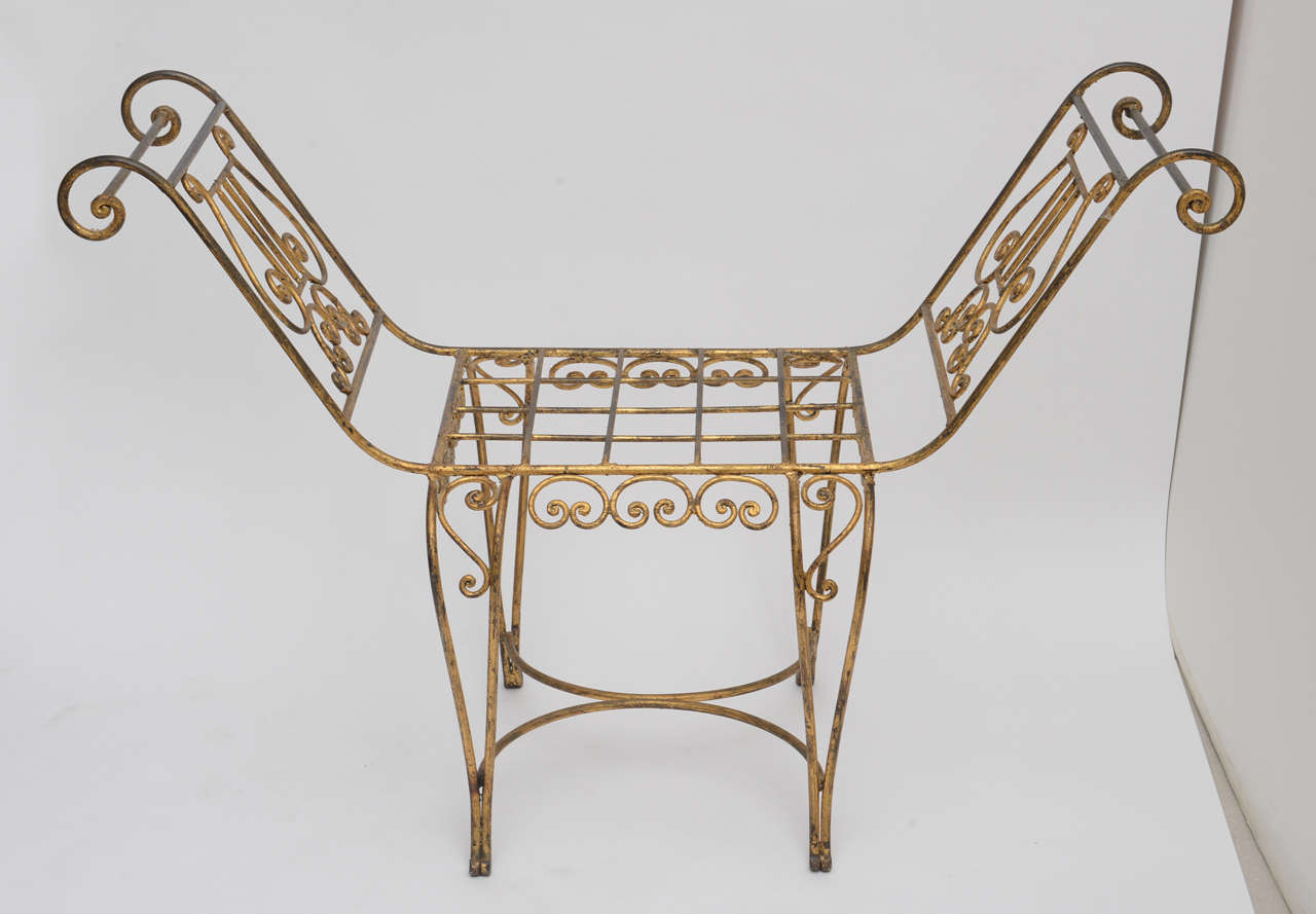 Ideal for an entry way or vanity this Italian bench is a whimsical expression of scrolls and lyres.
