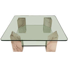 Interesting Coffee Table with Marble Corner Supports and Two Levels of Glass