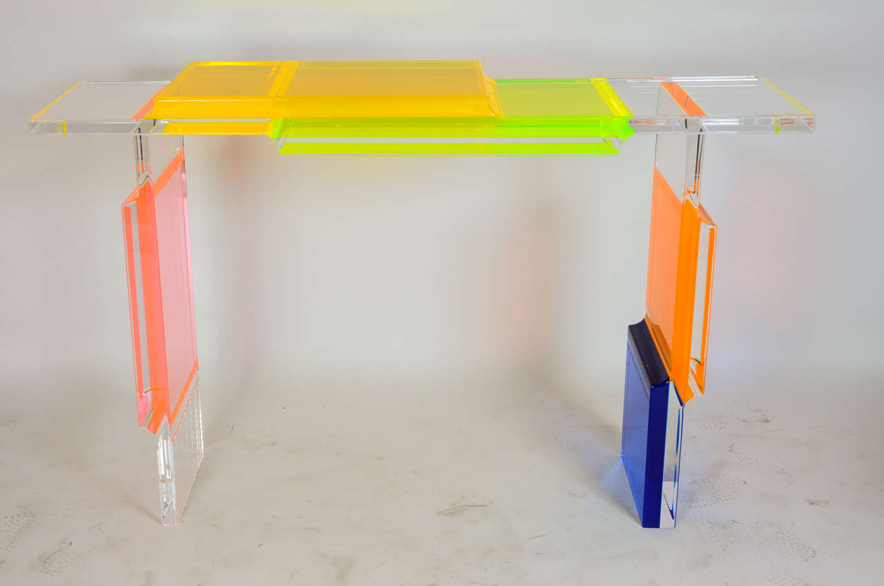 Very unusual console with colored acrylic Lucite.