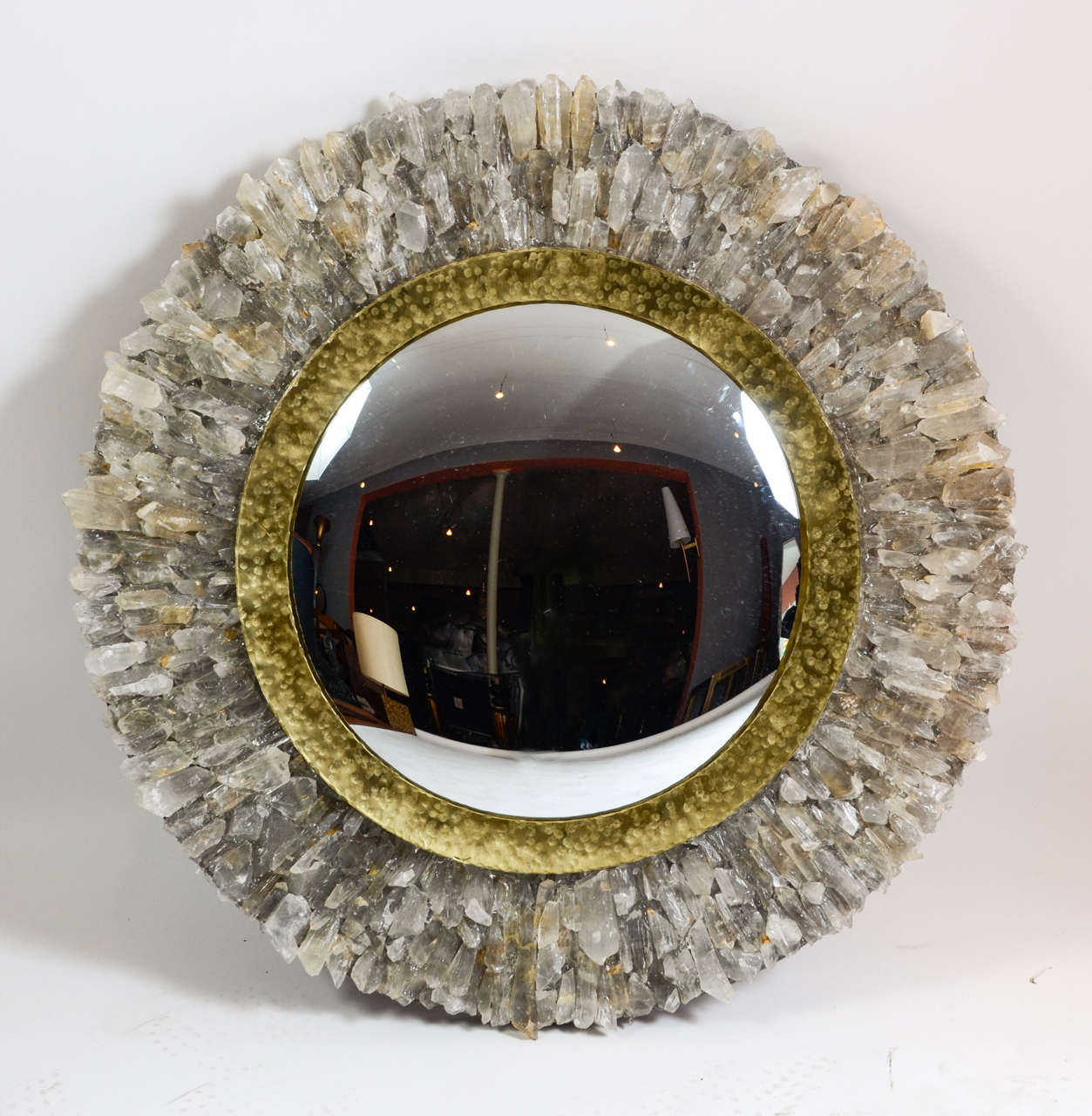 Incredible pair of convex mirror in rock crystal pieces
the mirror itself is highlighted with a round piece of hammered gilt metal