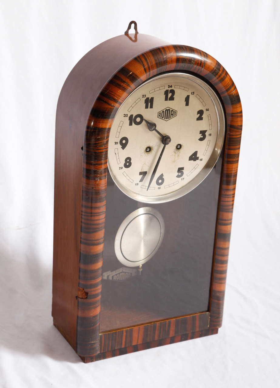Walnut and ebony Macassar veneered Art Deco clock.