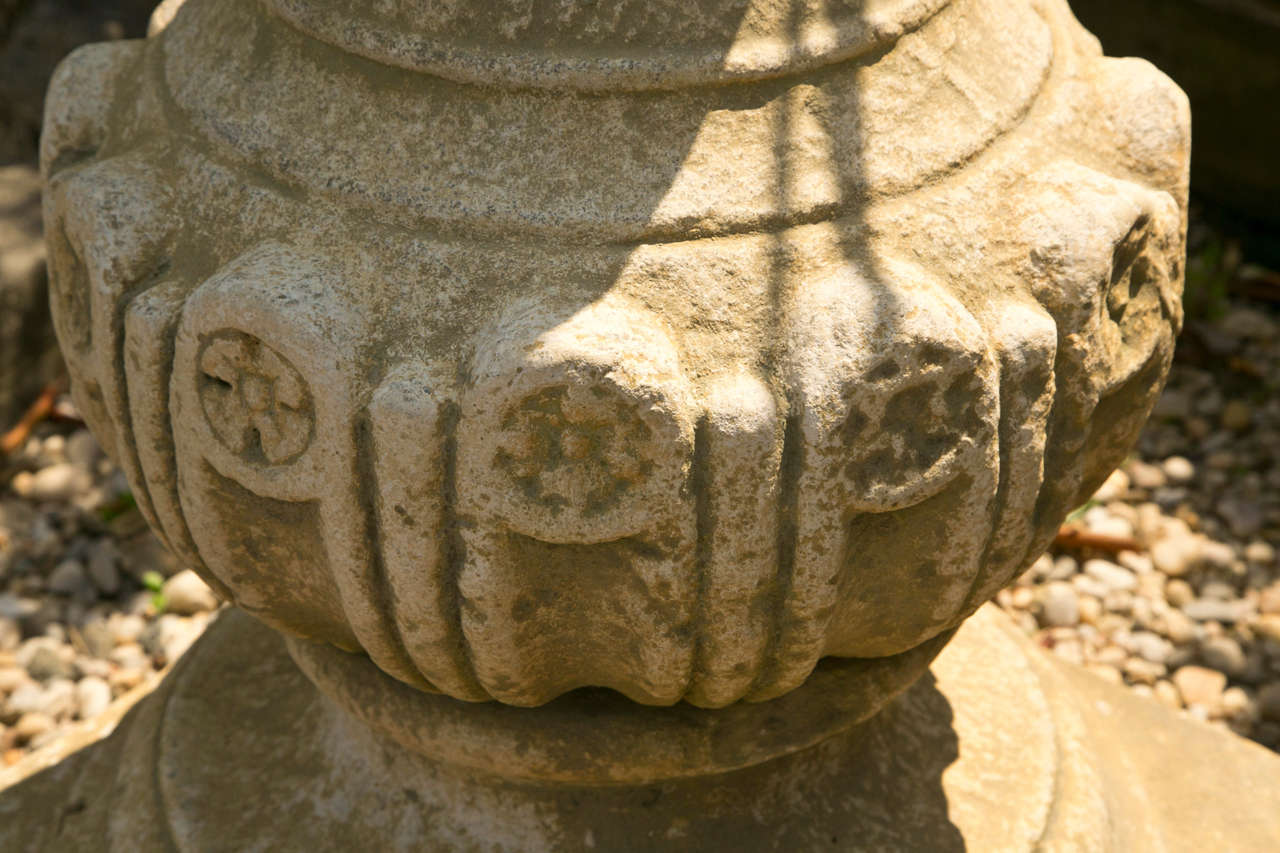Large bronze armillary on composition stone base.