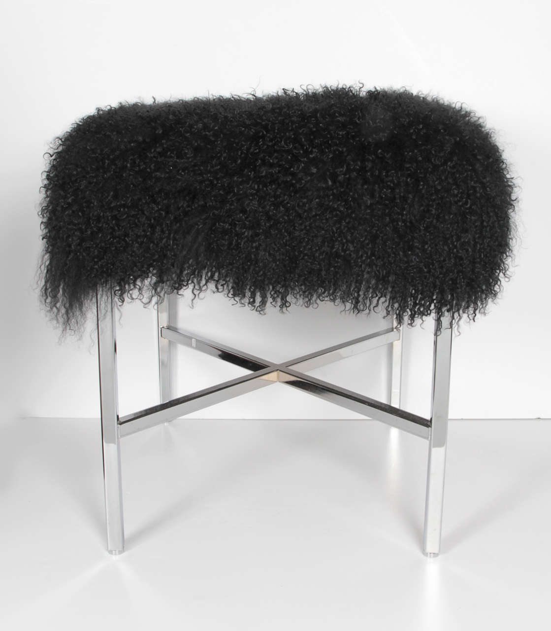 Mongolian lamb and chrome x stool. Newly upholstered.