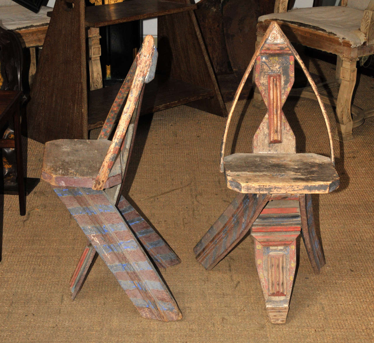 Pair of rare 19th Century Russian chairs in painted wood. Folk art. Good condition. Normal wear consistent with age and use.