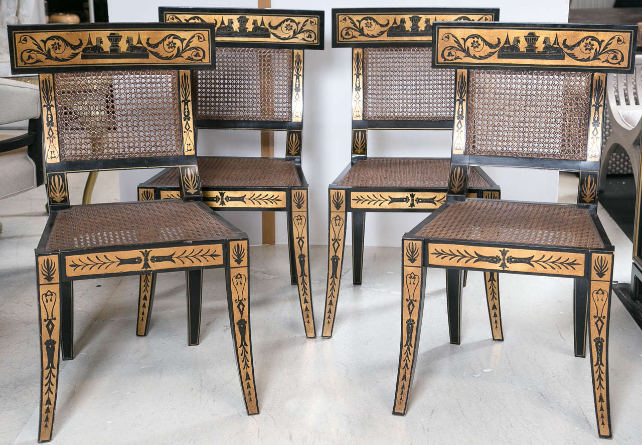 Set of four paint decorated Klismos chairs.