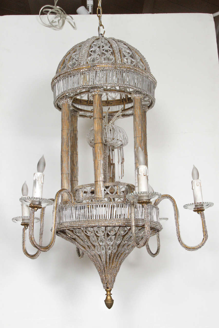 Pair of rare, hand-beaded, six-arm, pergola style chandeliers with woven domes and Chinese lantern, central pendant.