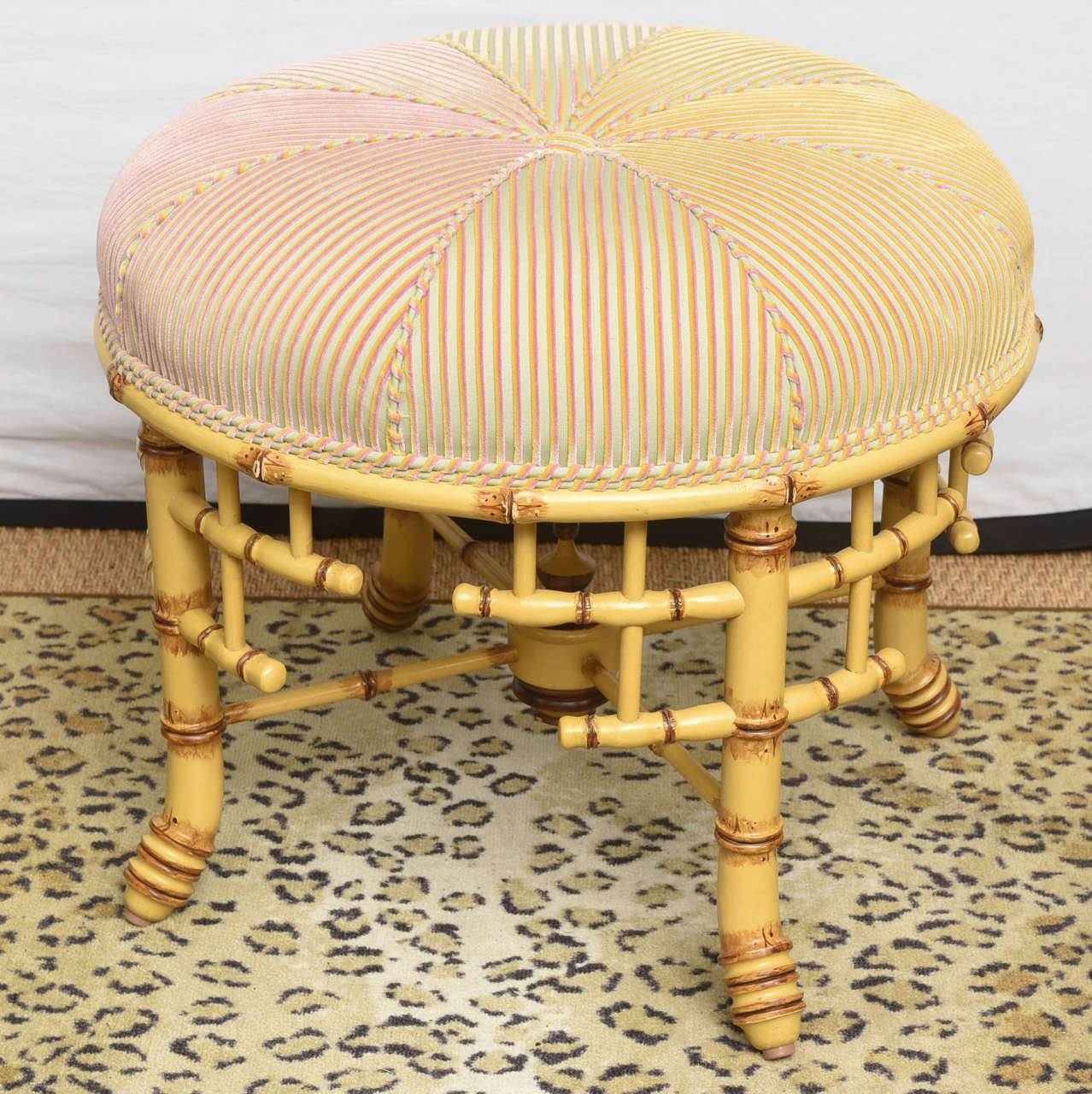 Schumacher & Co. (American (Delaware ,NYC , Contemporary), a pair of designer ottomans or stools (Brighton Round Stool-Mitered) with hand-carved European beechwood frame with simulated or faux bamboo motif. Wood frame in similar style to R.J.