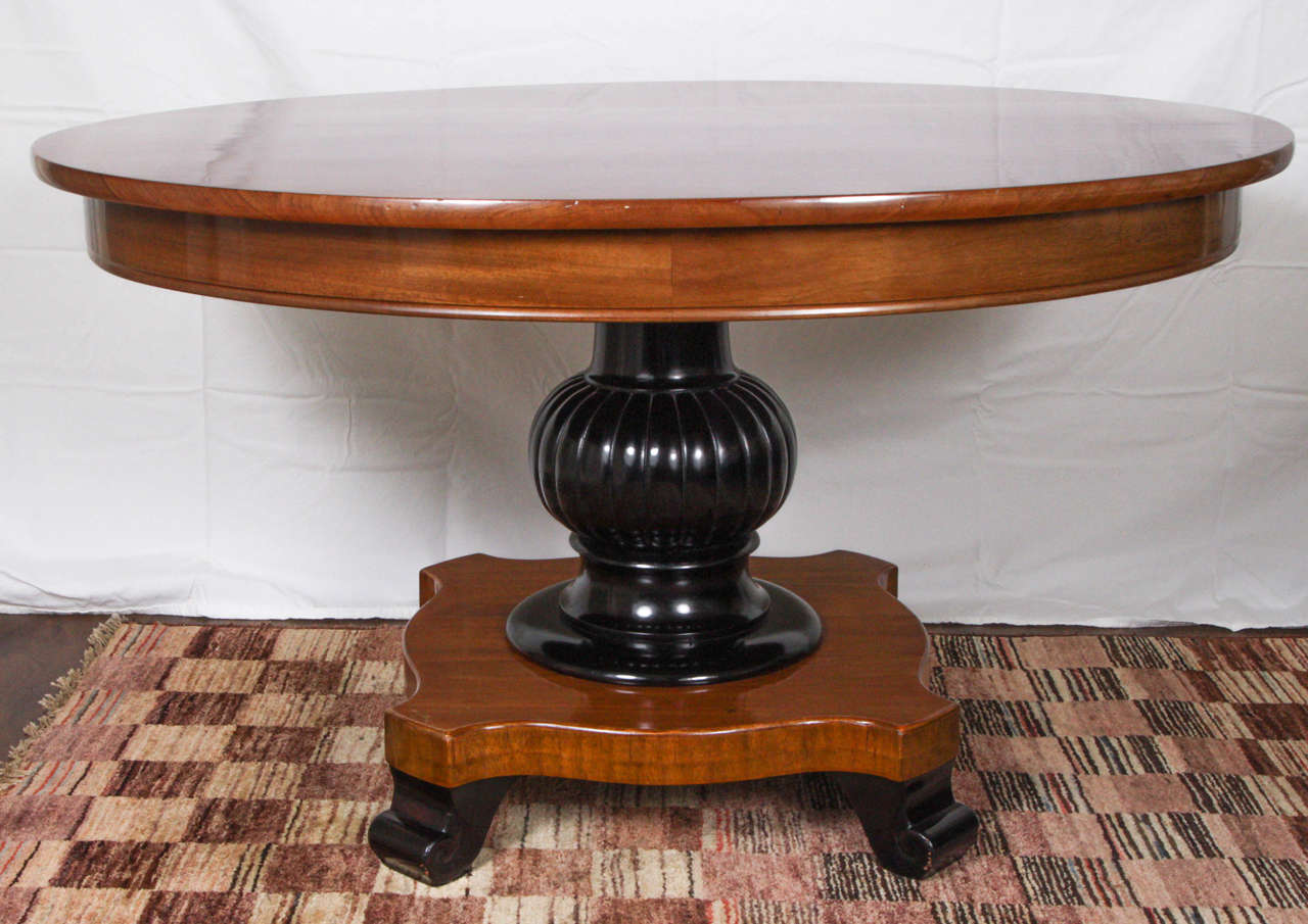 Vintage antigua mahogany oval pedestal coffee table with ebonized 