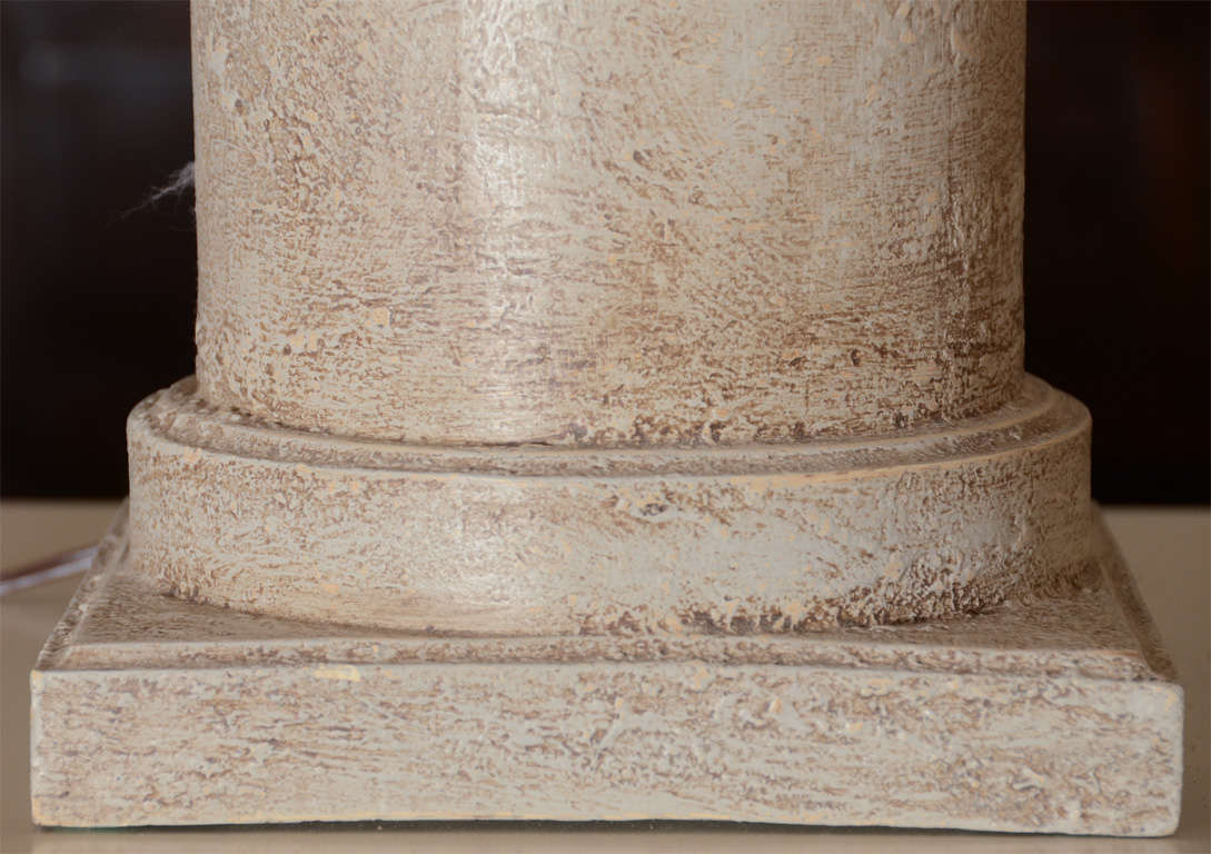 Pair of lamps greige cylinders with textured finish.