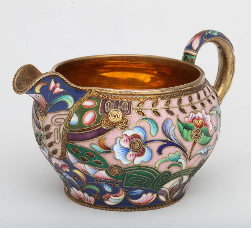 A fine Russian enamel on silver creamer decorated in shaded colors and signed MC for Maria Semenova and with 91 silver mark