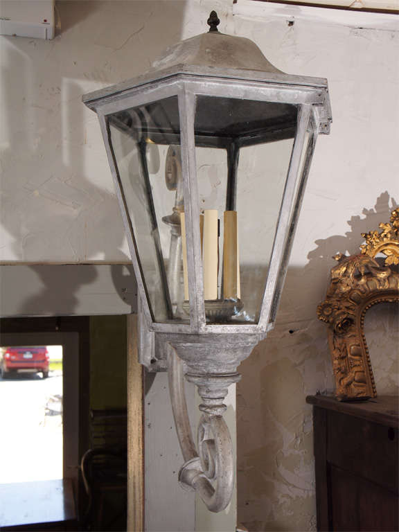 Pair of oversize antique street lanterns.  Ask us about modifying to place on top of lamp posts.