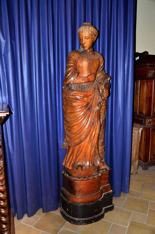 Large statue of Saint-Barbara with tower in natural carved oak. End of the 18th century