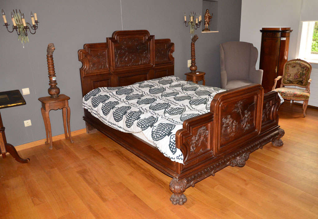 An Italian Chinoiserie Style Carved Walnut Bedstead