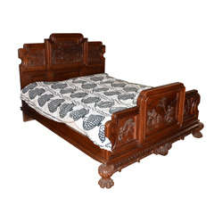 An Italian Chinoiserie Style Carved Walnut Bedstead