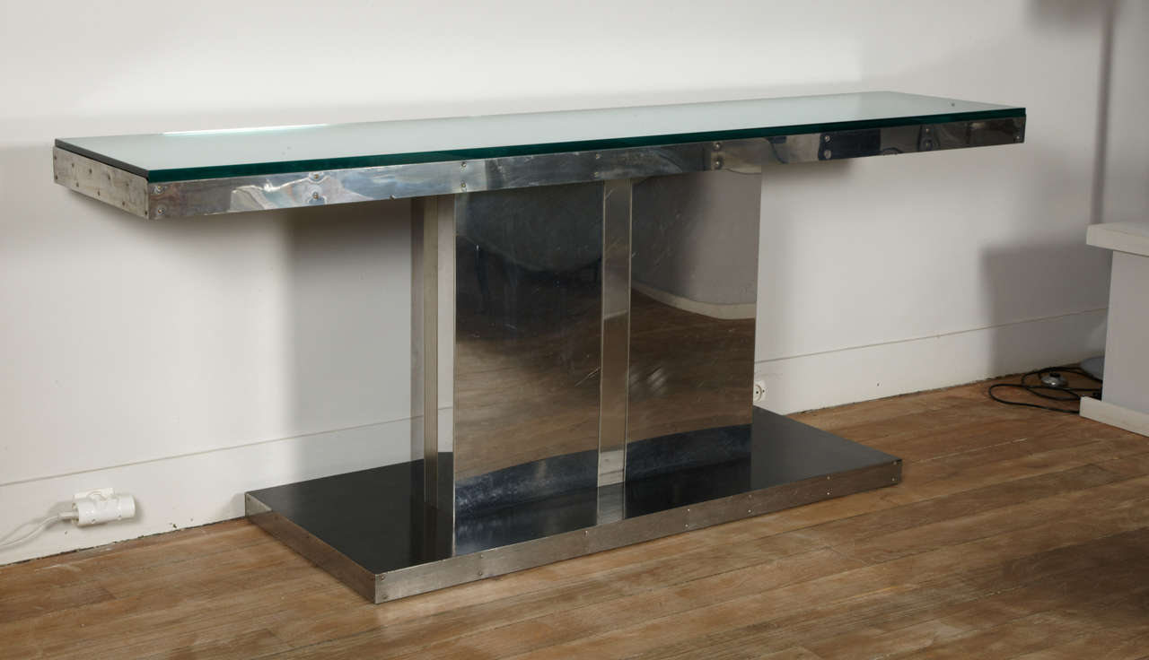  Large console table in polished steel, with black wood and  thick glass top.
Attributed to Vittorio Introini.
 Italy , circa 1970

 Perfect for a  sofa table !