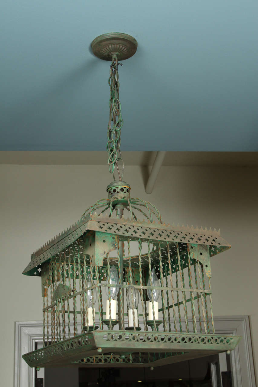 Antique bird cage light with aged green painted finish. Newly wired into a hanging light. 