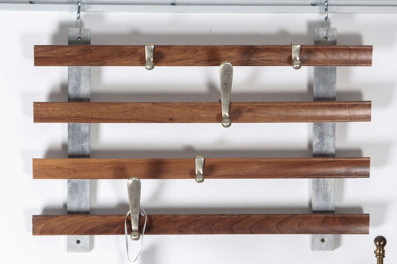 Unusual coat rack by Jules Wabbes. 

The racks are made of solid wengé wood and the 5 hooks are nickel bronze (2 large and 3 small). 

The item is signed by the artist on every single of the 5 hooks. 

This is a unique opportunity - such