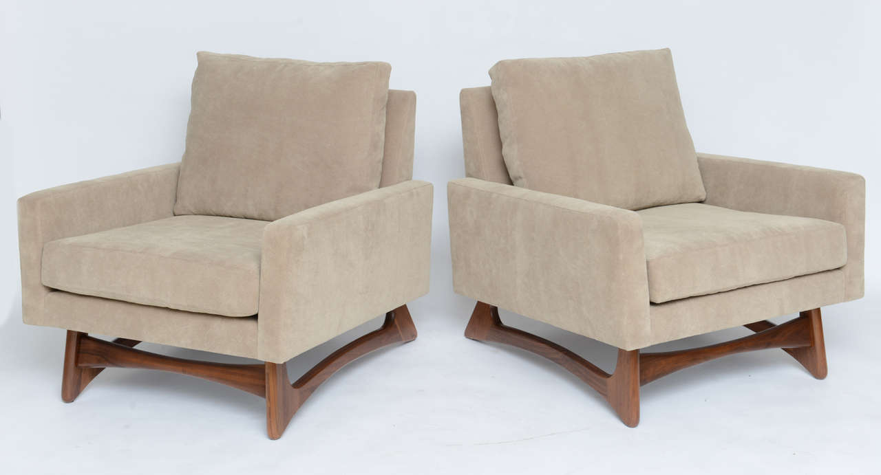 Low and sleek pair of 60's lounge chairs by Adrian Pearsall for Craft associates sit atop sculptural walnut bases. Newly restored.