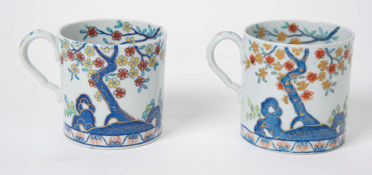 This is a good PAIR of COFFEE CANS made by the SPODE factory in the early 19th Century.

These cans are made from Ironstone China and are beautifully decorated with hand painted enamels in the chinoiserie Kakiemon style, pattern number