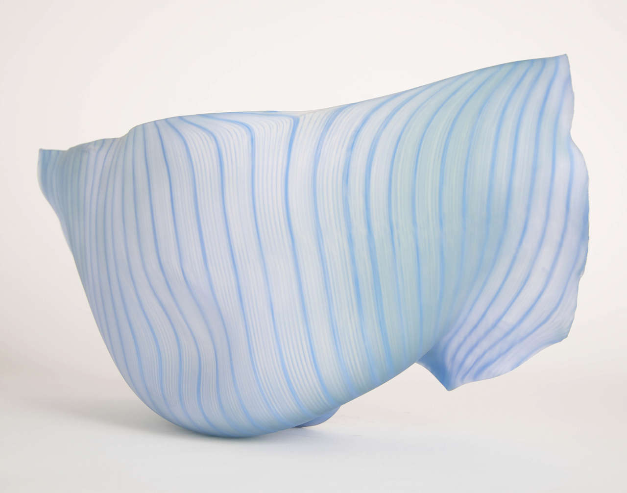 The large sculpture in pale blue color with white filigrana is one of the finest examples of large-scale free-form blown studio glass. Unique piece by Jeremy Maxwell Wintrebert.

The first time Wintrebert saw hot glass moving at the end of a blow