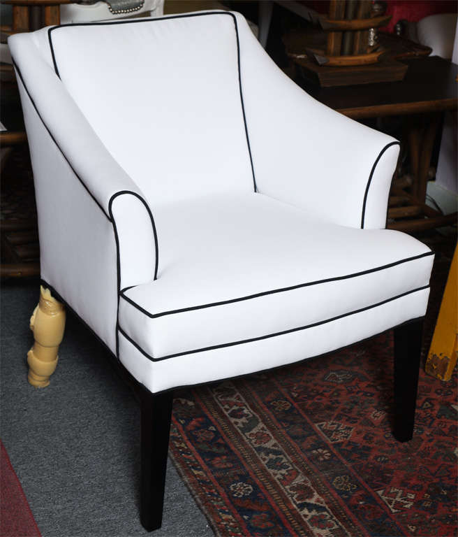 UPHOLSTERED IN HIGH QUALITY WHITE CANVAS TYPE FABRIC WITH  BLACK TRIM SPECIAL ORDERS,CUSTOM LEG COLOR,YOUR FABRIC AND SPECS.$1950.00 PER CHAIR (as shown)