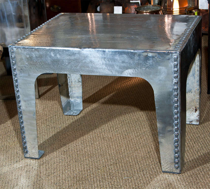Item #026-30 Show off your bold side with this fantastic polished steel tank top table!