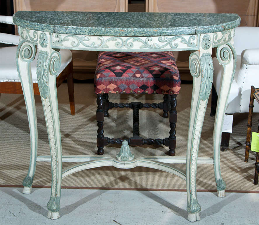 Perfect for a foyer or entry way, this tasteful, elegant console table manifests charm and class.