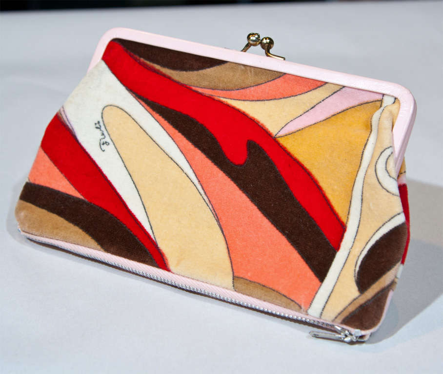 The FunkyFinders forte includes never used vintage Pucci Purses, Scarves, Jewels, Couture, Objects d'Art, and Linens. Here we have a sleek, signed Clutch ready for festivities on the town. It is signed 'emilio' in the print, boasts a main
