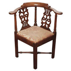 Antique English carved walnut corner chair.