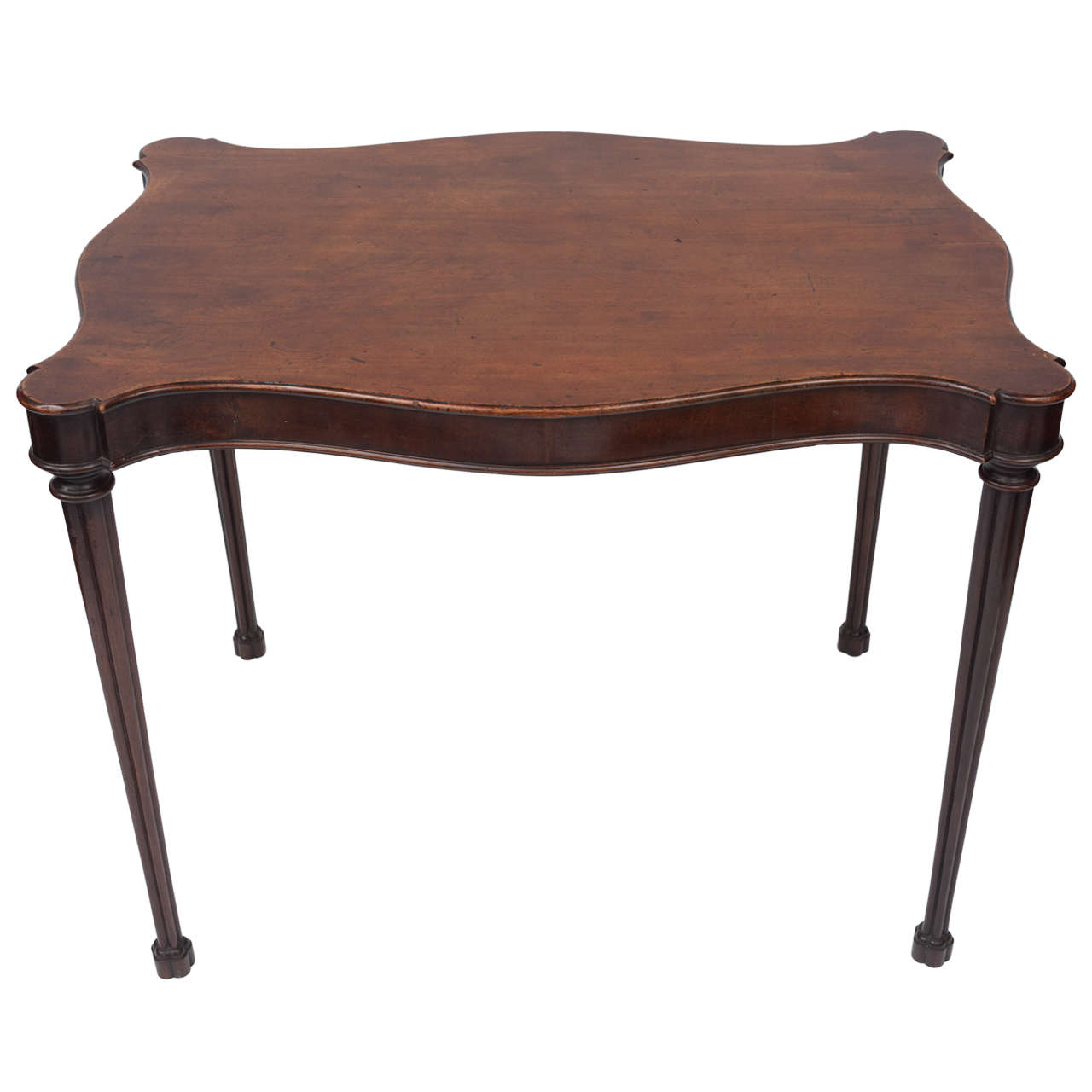 A Geo III mahogany silver table of unusual serpentine form For Sale