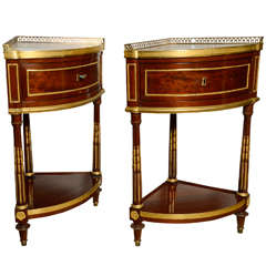 A Louis XVI Pair of Corner Cupboard