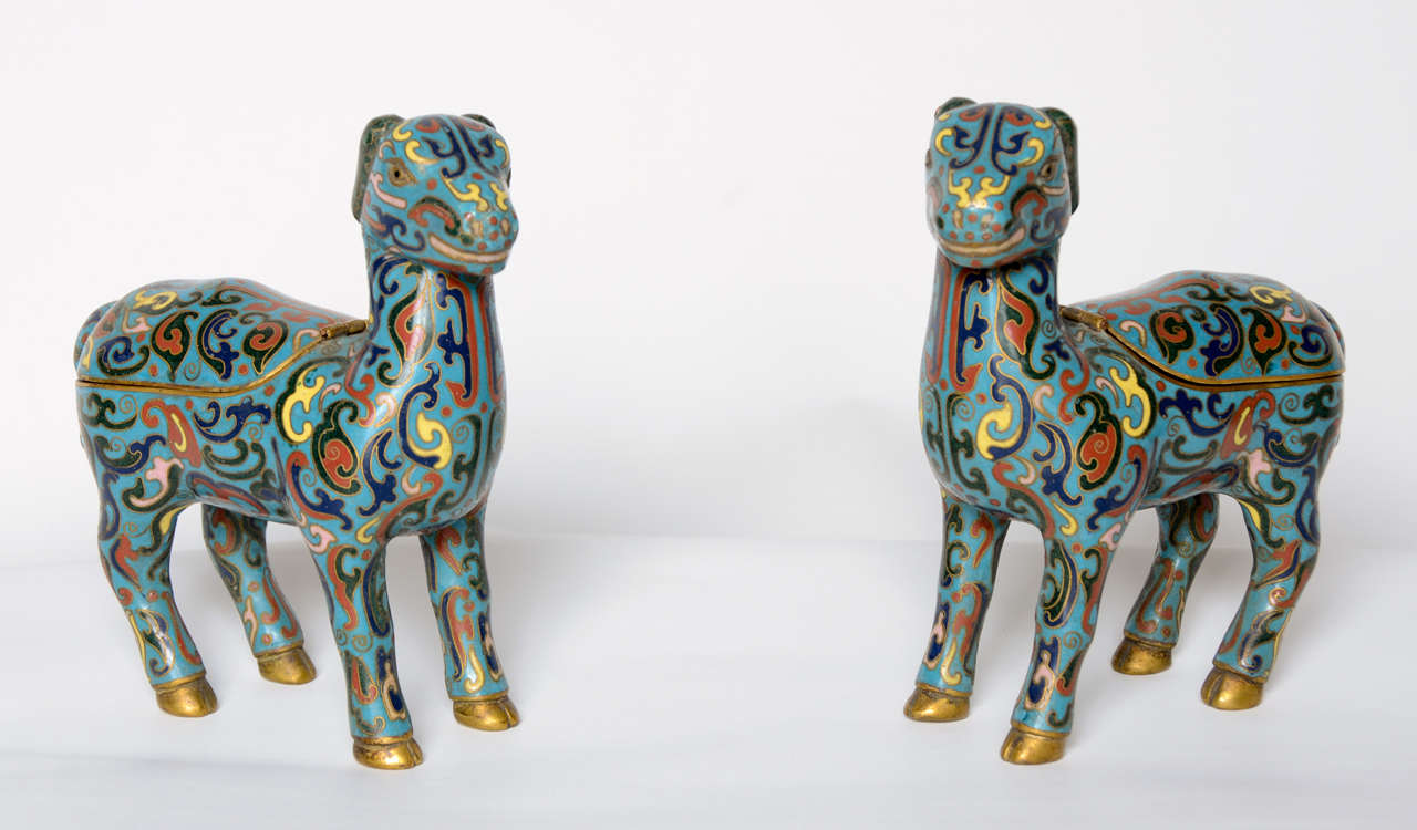 A pair of chinese cloisonné deer