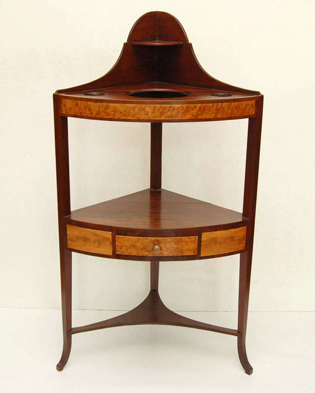 A very attractive and slender New England wash stand made to fit a corner (has a 16