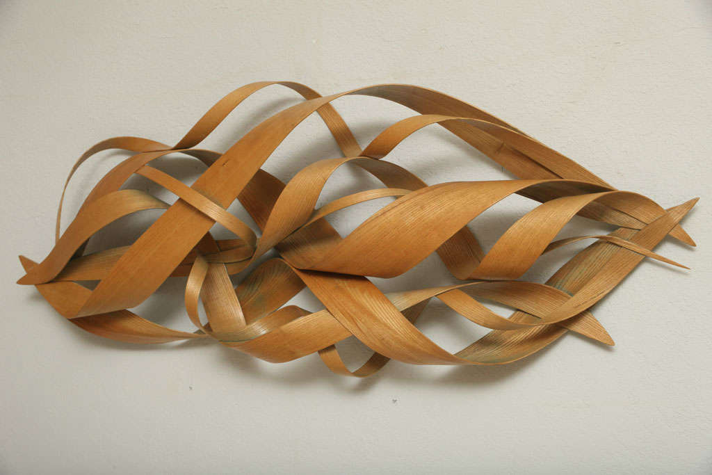 American artist, Renee Dinauer, has been creating these gorgeous, steamed bentwood pieces since 1990. We love the lyrical naturalism of this sculpture, which has only the faintest 
