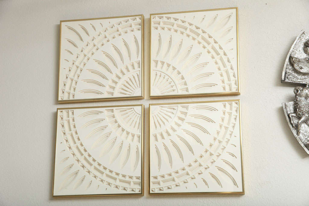 Four framed, multi-layered, cut-paper pieces by Greg Copeland join to form a radiant off-white sunburst. Signed. (Measurements below are for a single framed piece.)