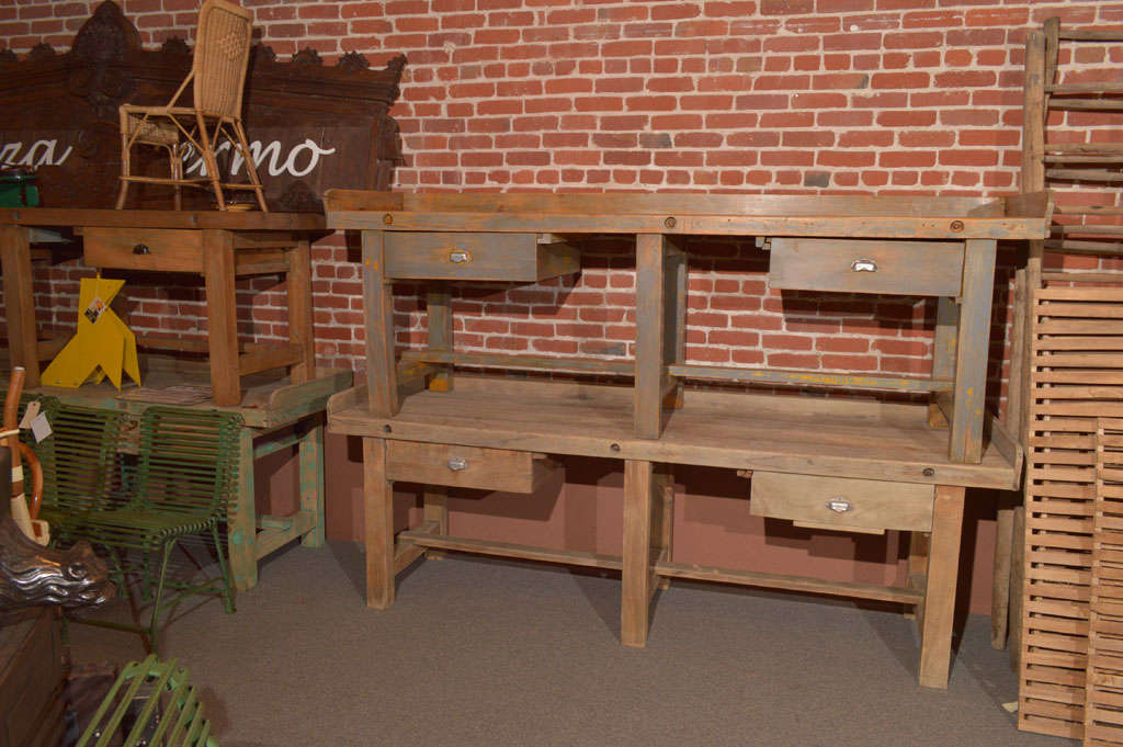 Heavy duty wood workbenches with two drawers each and nice patina
Made by MANBO, Nantes FRANCE
20th C. 
