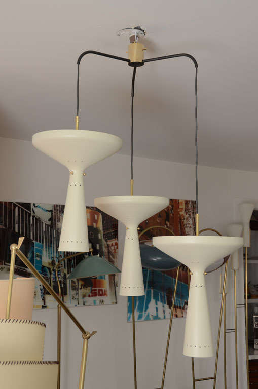 Italian Chandelier by Stilnovo.
Tree Off White Shades Hanging From Tree Black Arms and a  Brass Cylinder. Rewired