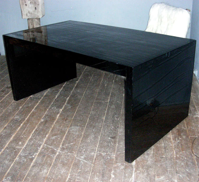 1970s black lacquered oak desk, in the style of Maison Jansen.