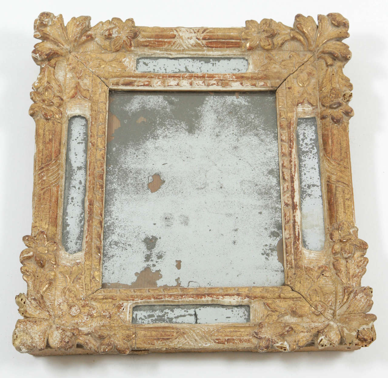 A small Carved and Gilt French Rococo mirror, circa 1750